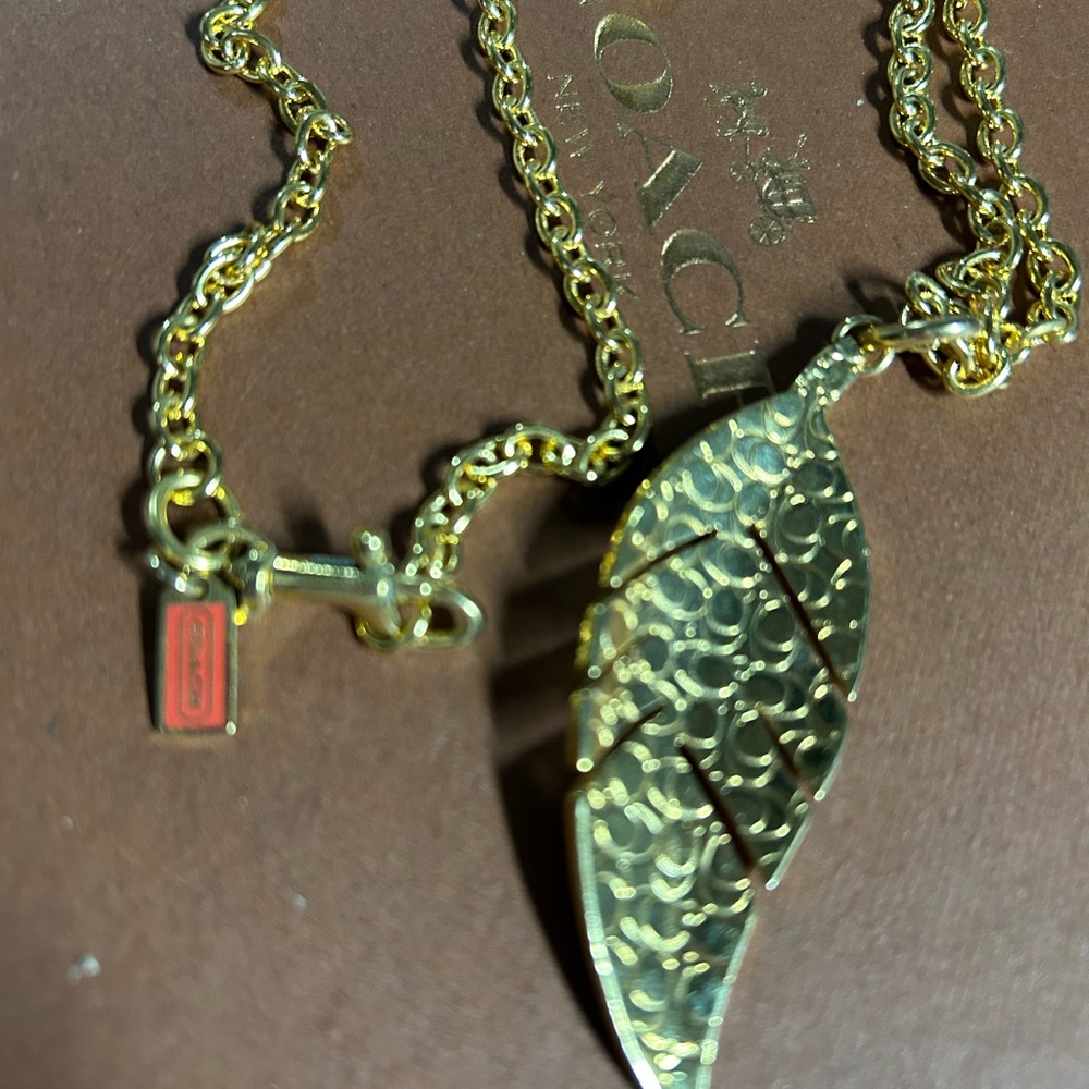 Coach Gold-Tone Blue & White Feather Pendant Necklace - Picture 2 of 2